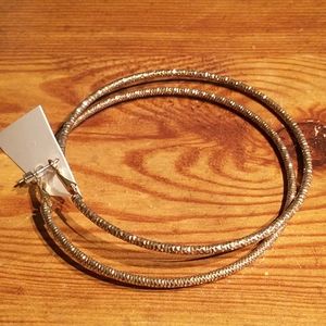 Gold tone pierced earrings